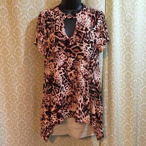 Jennifer Lopez sharkbite tunic